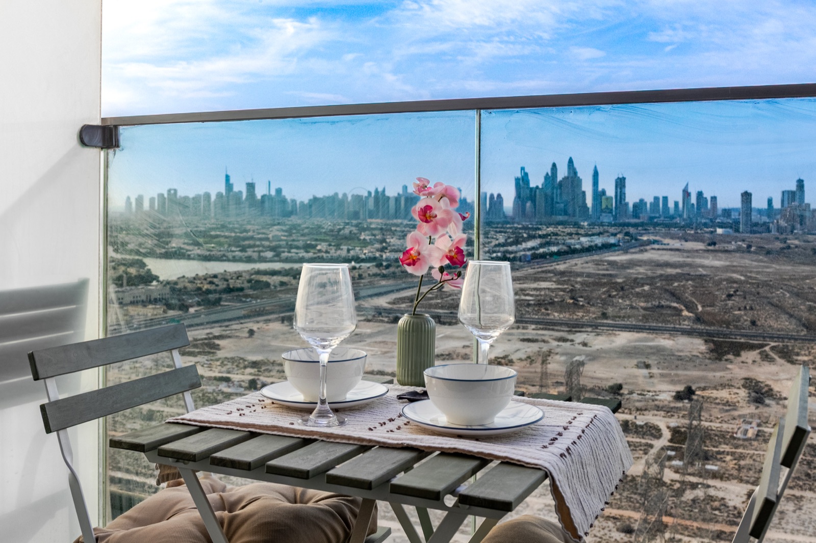 Dubai Marina skyline from a private balcony of an Erbacci residence at Bloom Towers