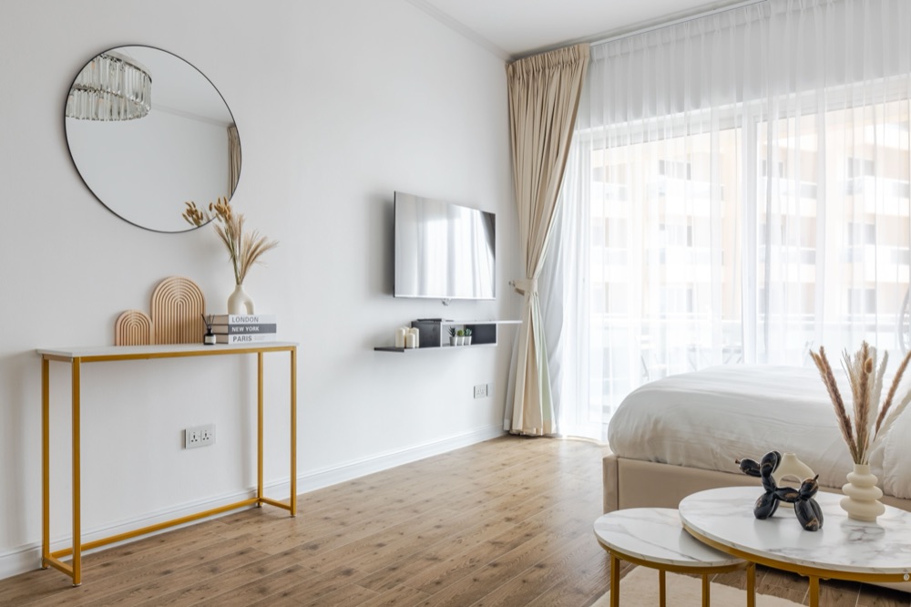 Living area of a Crescent Tower studio designed by Erbacci Properties